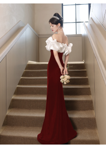 Red and white velvet evening gown in mermaid silhouette