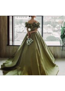 Green satin evening gown with off-the-shoulder bodice