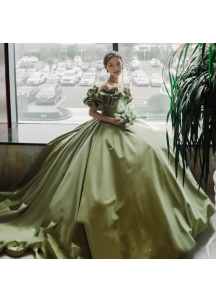 Green satin evening gown with off-the-shoulder bodice