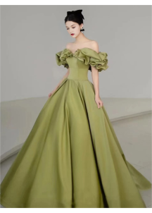 Green satin evening gown with off-the-shoulder bodice