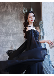 Black evening gown in chiffon with train