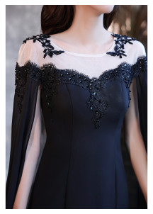 Black evening gown in chiffon with train