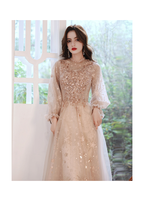 Champagne tulle evening gown embroidered with sequins and pearls