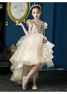 Vestido de dama de honor para niña en tul dorado brillante con falda asimétrica