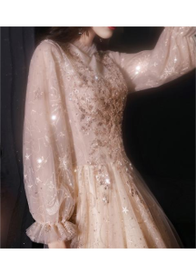 robe de soirée en tulle champagne brodée de sequins et de perles