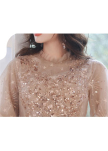 robe de soirée en tulle champagne brodée de sequins et de perles