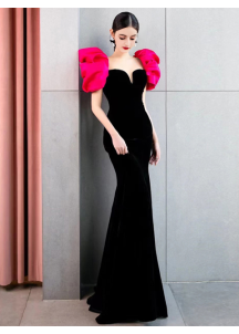 Black velvet evening gown with pink puff shoulders