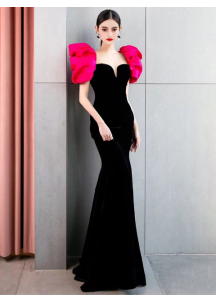 Black velvet evening gown with pink puff shoulders