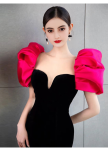 Black velvet evening gown with pink puff shoulders