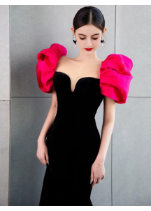 Black velvet evening gown with pink puff shoulders