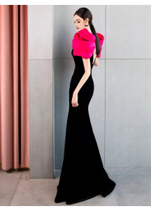 Black velvet evening gown with pink puff shoulders