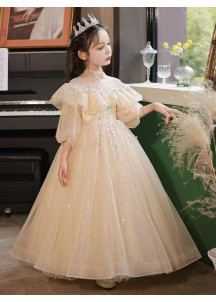 robe fille de cérémonie champagne avec col montant transparent et les épaules dégagées