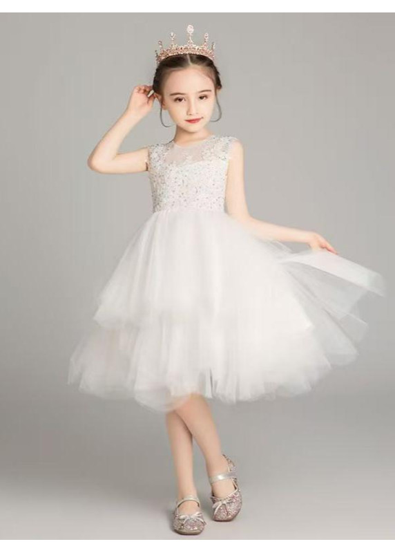 robe fille de cérémonie en tulle blanc volants superposés jupe asymétrique