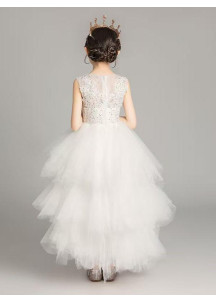 robe fille de cérémonie en tulle blanc volants superposés jupe asymétrique