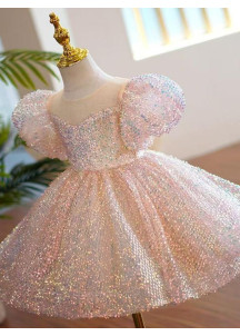 robe de fête petite fille recouverte de sequins rose avec grand nœud assorti