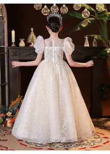 robe de cérémonie petite fille princesse en tulle champagne brodé de motifs argentés