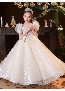 robe de cérémonie petite fille princesse en tulle champagne brodé de motifs argentés