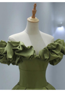 Green satin evening gown with off-the-shoulder bodice