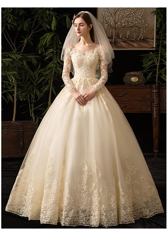 Wedding dress with a lace bodice and long sleeves