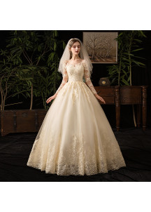 Wedding dress with a lace bodice and long sleeves