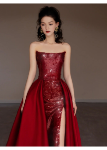 Burgundy red strapless evening gown with sparkling sequins