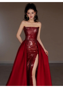 Burgundy red strapless evening gown with sparkling sequins