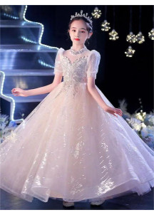 robe de fille d'honneur en tulle champagne d'une légèreté aérienne